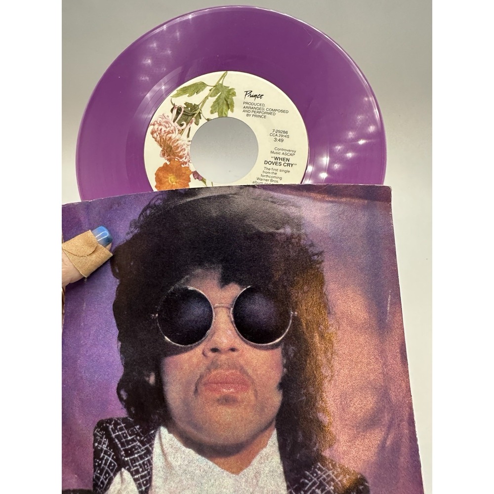 T4-72 PRINCE AND THE REVOLUTION‎ When Doves Cry - PURPLE VINYL - 1984 - 7-29286